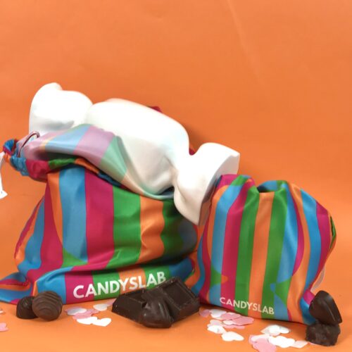 Sacche multicolor con caramella bianca